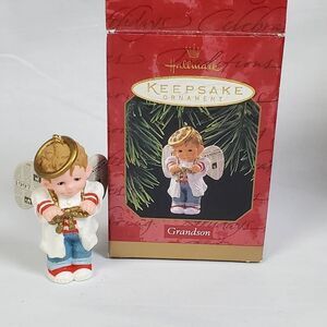 1997 Hallmark Keepsake Ornament “Grandson” Angel Boy by Sue Tague with Box